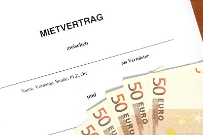 Mietvertrag, 50 Euro-Scheine und Stifte