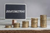 Münzstapel zum Thema Zusatzbeiträge