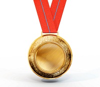 Goldmedaille mit rotem Band