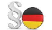 Paragrafenzeichen und Deutschlandflagge